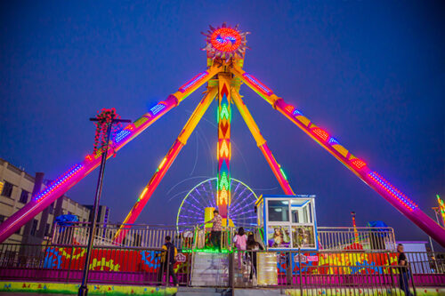 Amusement Park Big Pendulum Ride at Night